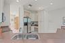 Open Kitchen to the Living Room and Family Room, stainless steel appliances.
