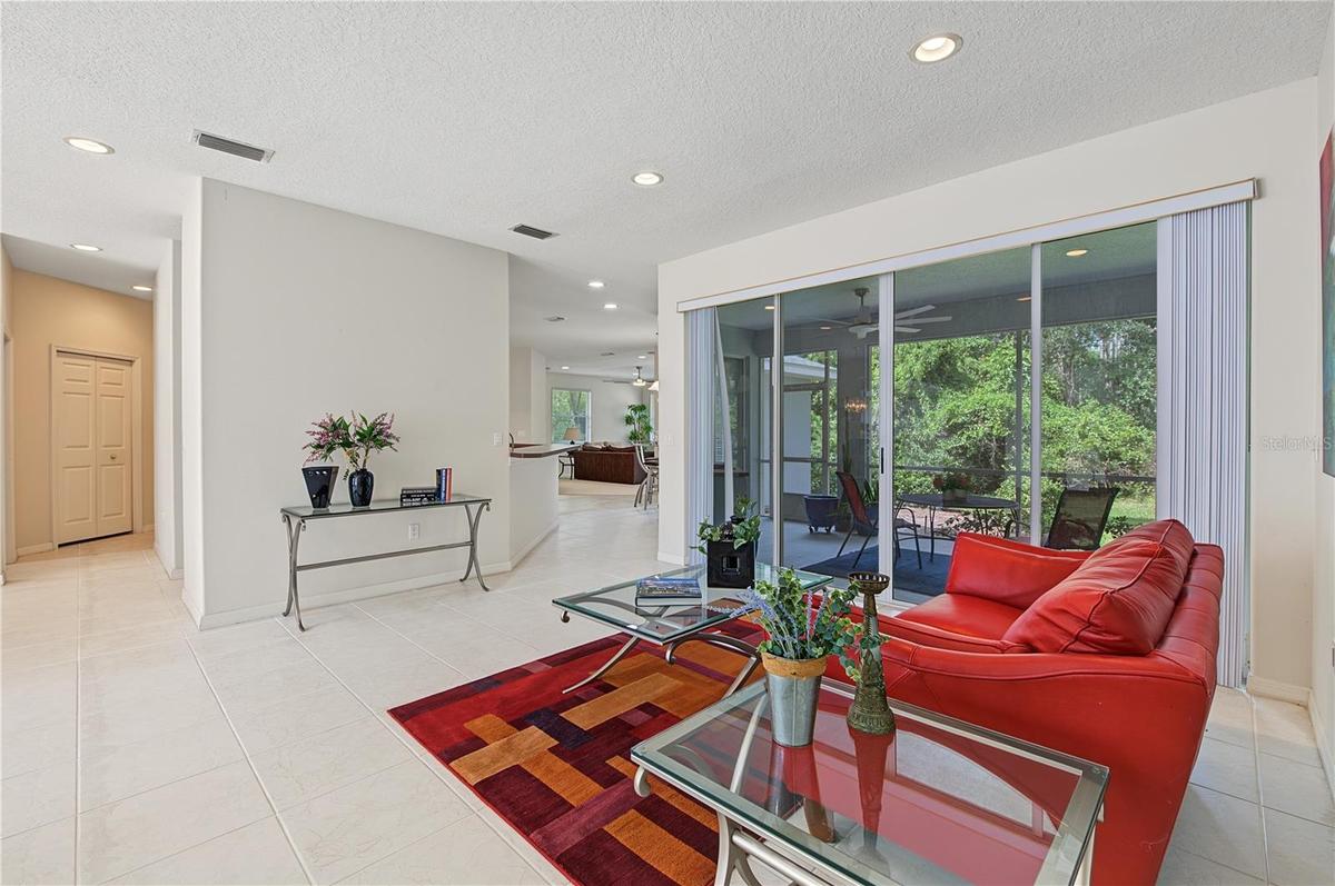 Living Room overlooking the backyard and patio