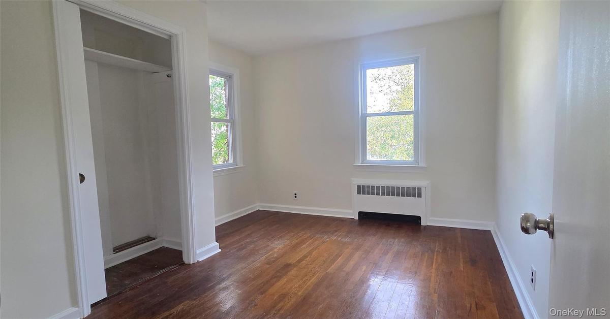 Second bedroom has hardwood flooring
