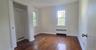 Second bedroom has hardwood flooring