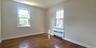 Bedroom has hardwood flooring