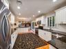 Breakfast bar adds additional cabinets and seating