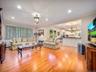 Family room with hardwood floors and recessed lighting