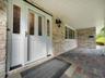 Covered front entry with multi-color natural Vermont Slate tile.