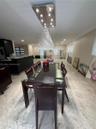Polished marble-look flooring extending throughout