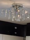 Chrome ceiling light fixture with multiple crystal drops
