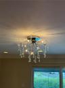Decorative ceiling-mounted light fixture with crystal details