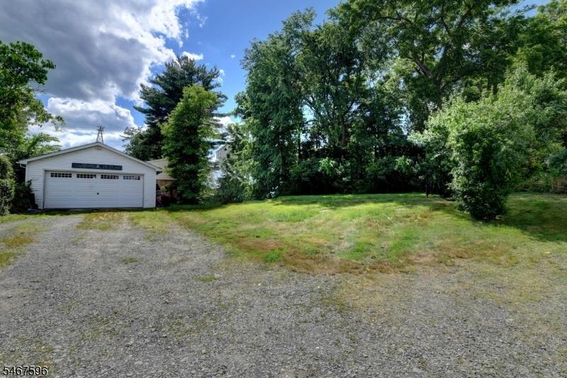 long driveway with garage