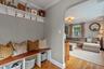Built-in storage off the front entrance and on the way to the family room.