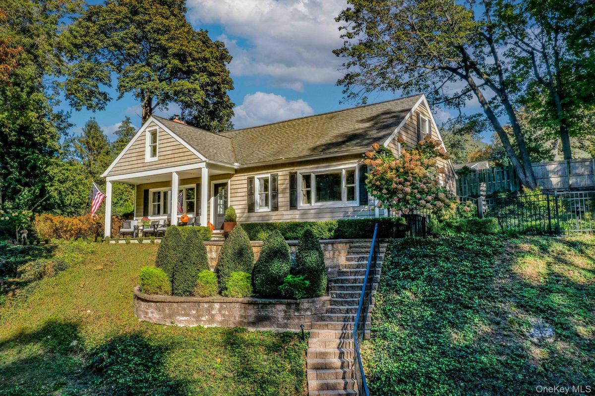 Hilltop living - house is high up above street level with tons of privacy.
