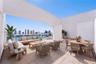 Private Rooftop. virtually staged. Furniture and décor are digitally added and are not included in the sale
