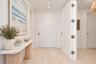 Virtually Staged- Entry Hallway with Pocket Door to Den/Office