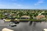 Watch the boats go by on the famous, extra-wide Bimini Canal