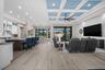 Tray ceilings and tile floors in the open concept living area