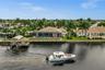 Aerial rear view of the house and dock