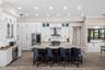 Coffee bar with beverage cooler next to the island