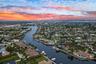 Aerial evening view with Bimini Square and Downtown Cape Coral in the background