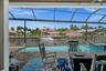 Watch the boats go by right from your lanai on the extra wide Bimini Canal