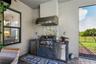 Outdoor kitchen gas grill with hood and sink