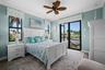 3rd bedroom with direct access to the lanai and pool
