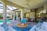 Outdoor Living space w/ Pool lanai, outdoor kitchen & dining