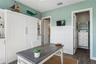 Bedroom 2- built-in Murphy bed with custom shelving and storage