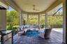 Outdoor covered living space w/ Teak furniture