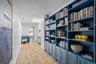 Gallery hallway leads to 3rd bedroom.