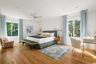 Serenely beautiful primary bedroom suite.