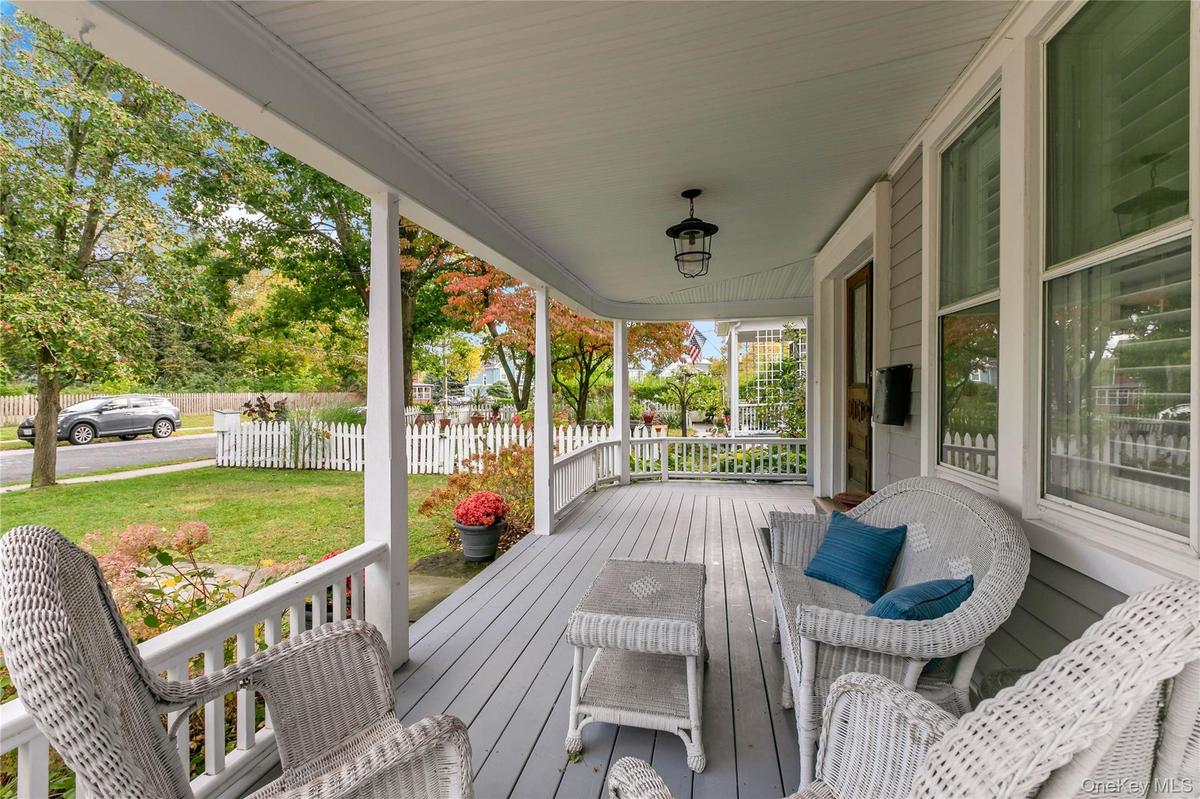 Welcoming gracious covered front porch.