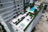 Expansive rooftop terrace featuring a rectangular swimming pool, integrated spa, built-in landscaping planters, and tile flooring