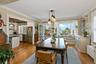 Formal dining room with custom window seat and dramatic views.