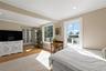 Convenient laundry access and door to second story deck.