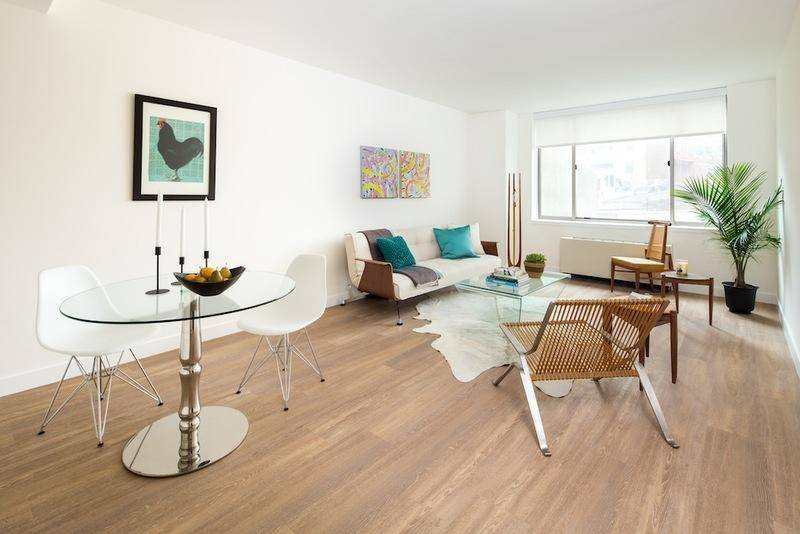 Stunning 2 bedroom, water views, rooftop deck w/ grilling stations, fitness center! Financial District!!