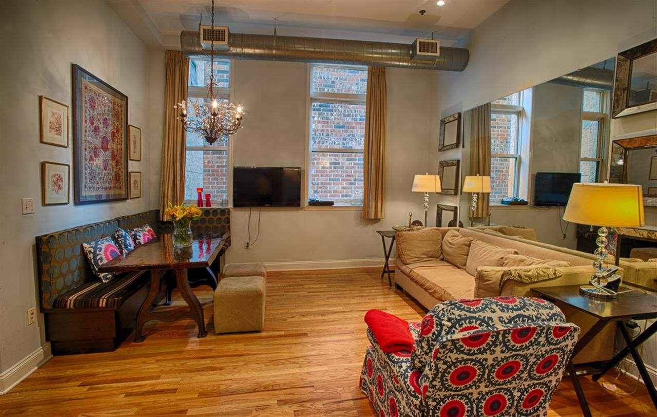 Fabulous 2 BDRM 2 BATH with on- site garage parking in a loft style industrial chic building