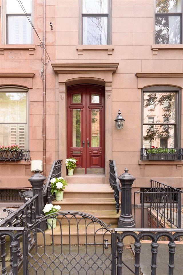 Truly an exceptional mix of Victorian era and stylish modern-day amenities in this well-designed four-story Brownstone