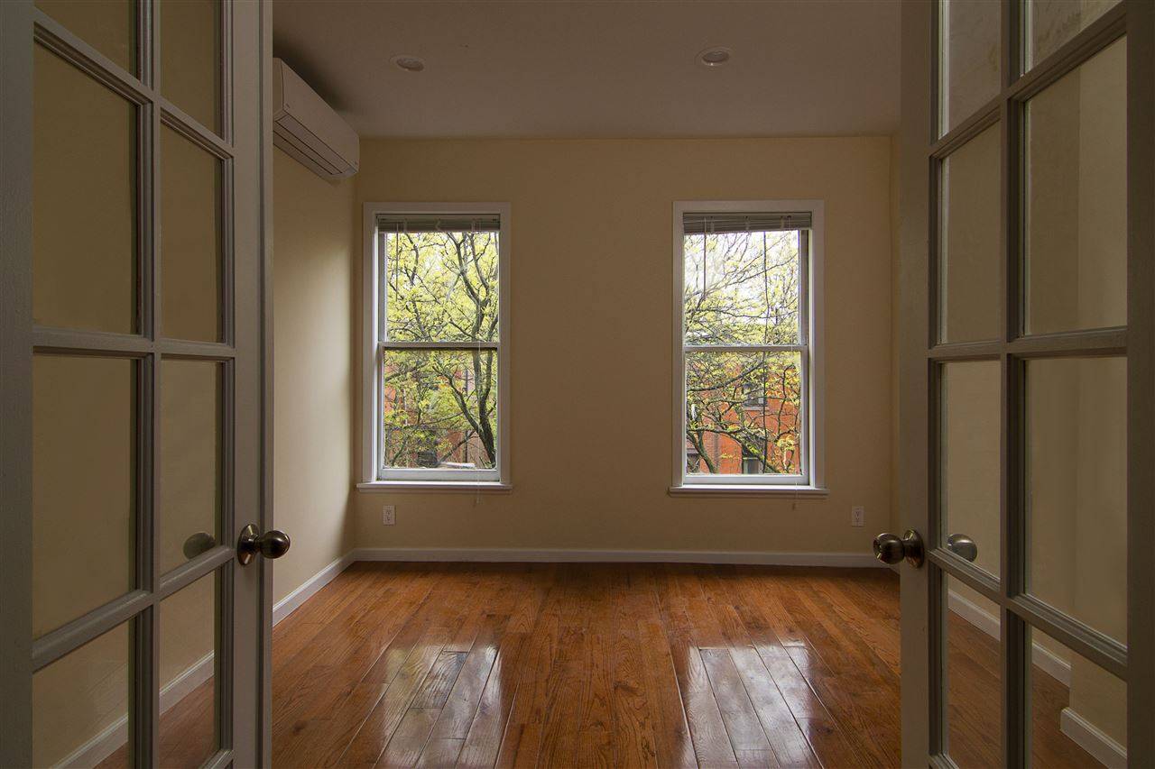 Spacious 2 bed/1 bath condo for rent in one of the most beautiful blocks in Downtown Jersey City