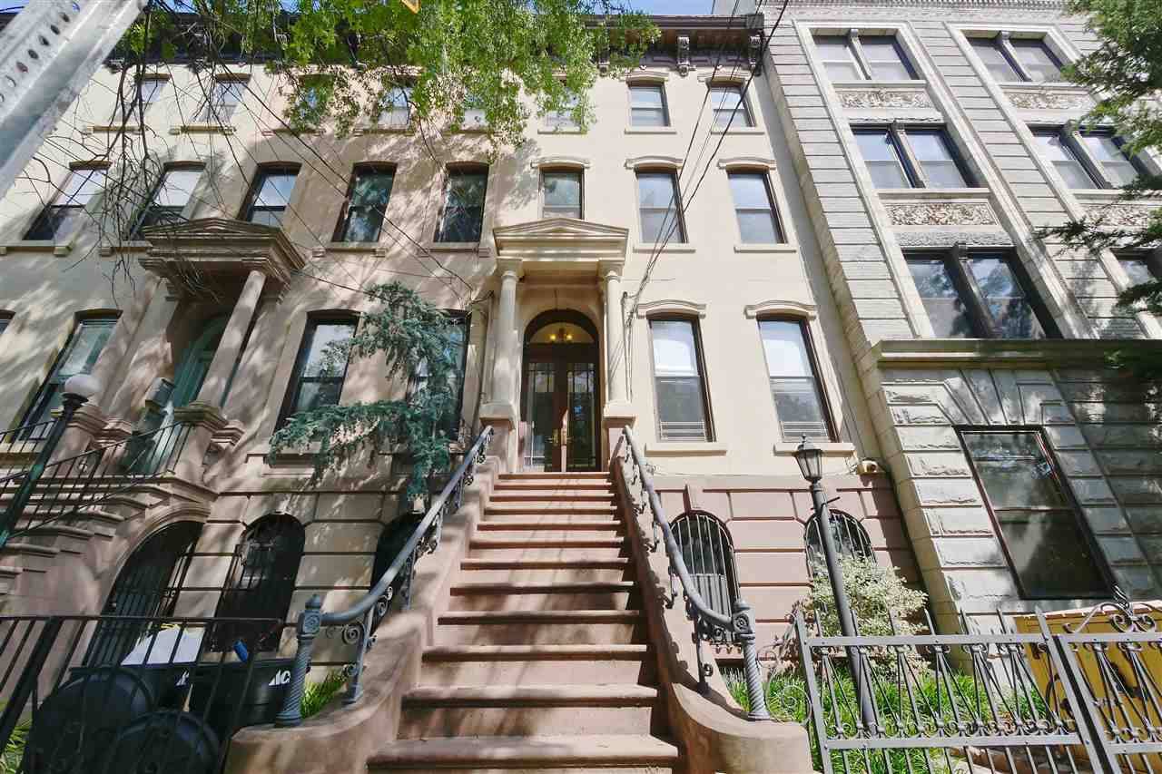 Welcome yourself to this huge & inviting Brownstone home complete with private yard and directly facing Van Vorst Park