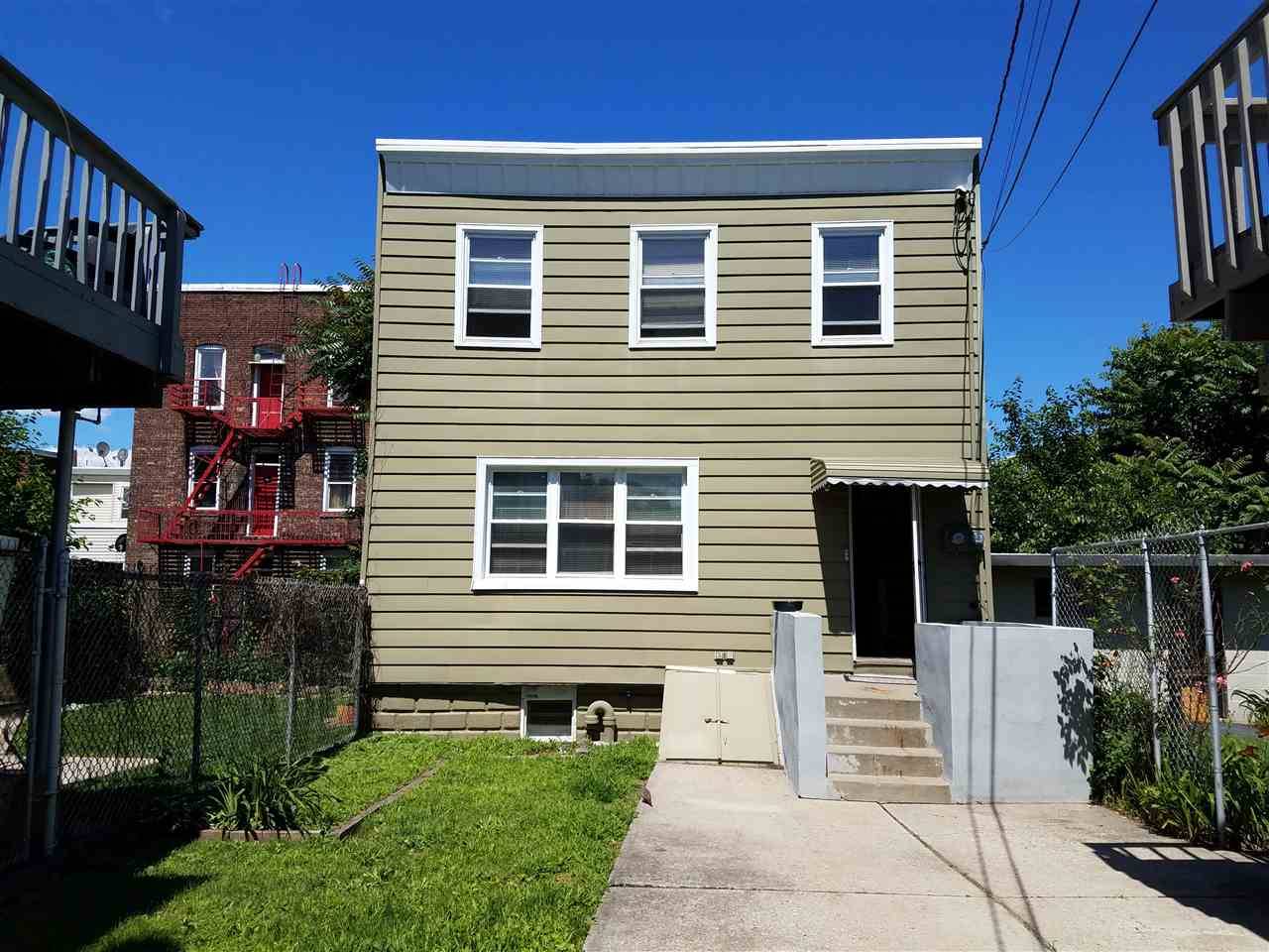 This cozy apartment located on the second floor of this two-family home in Journal Square comes with the utilities included