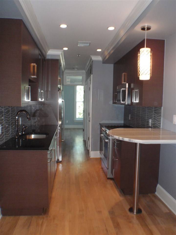 Move into this tastefully designed Adams Street 2 bedroom condo rental