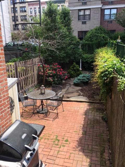 Beautiful and sunny 1 bedroom plus separate office located in a charming brick building on one of Hoboken's most sought after streets