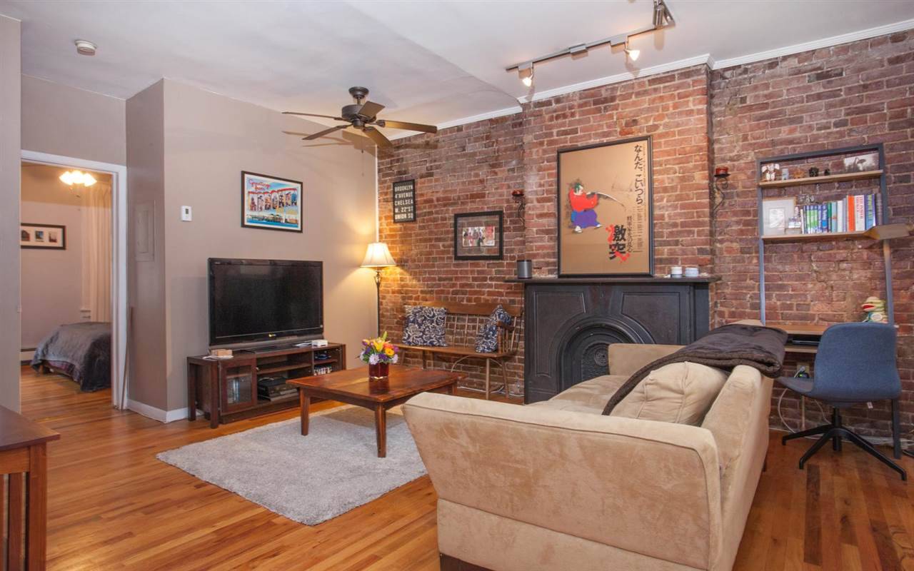 Wonderfully laid out 1 bedroom nestled in a rear carriage house behind the main building