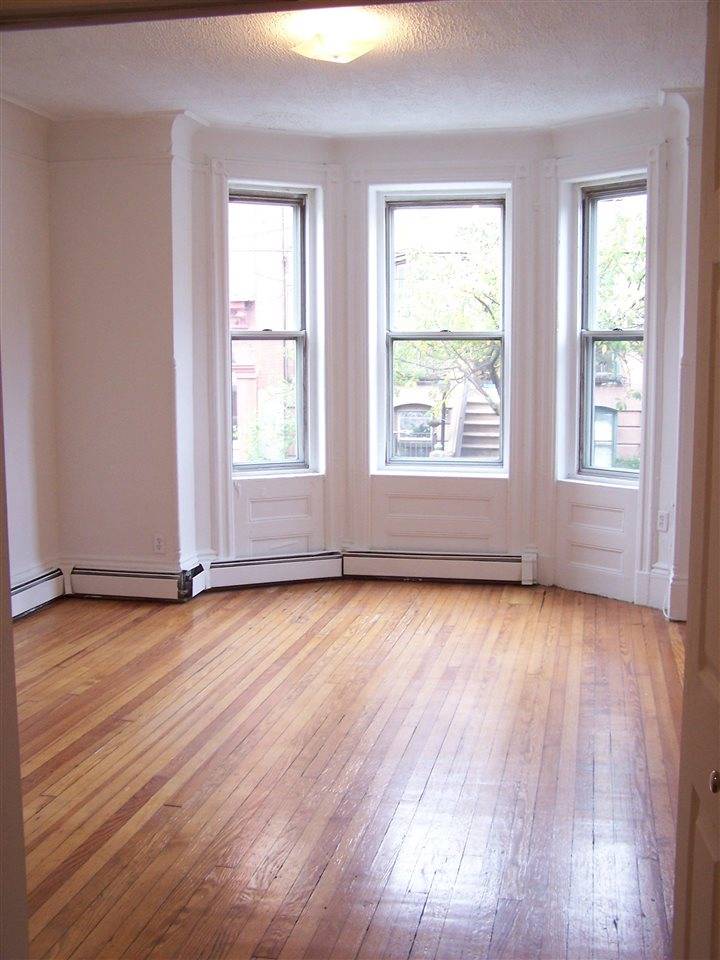 **AMAZING OPPORTUNITY**LARGE TWO BEDROOM PLUS DEN/POSSIBLE THREE BEDROOM**HOT UPTOWN HOBOKEN LOCATION THIS EXPANSIVE APT