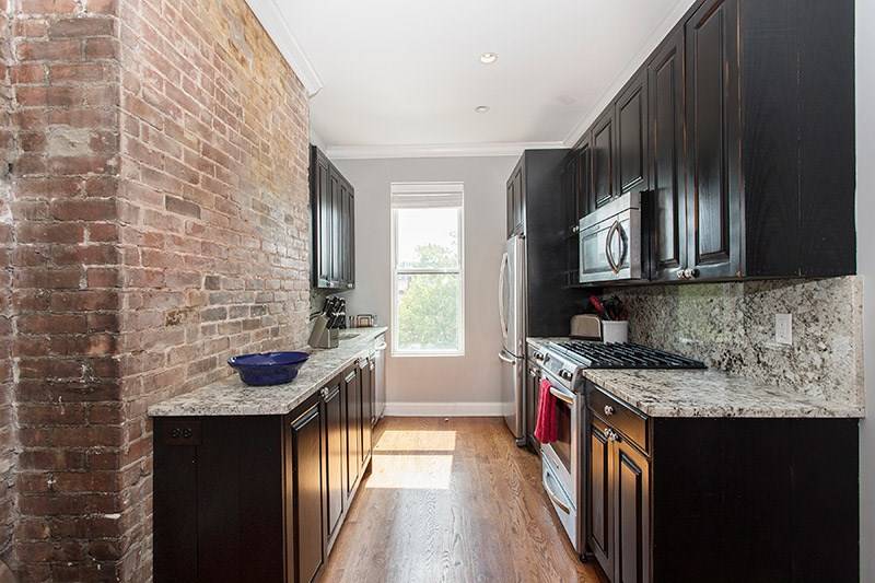 Beautifully renovated split 2 bedroom condo located on highly sought after Garden Street