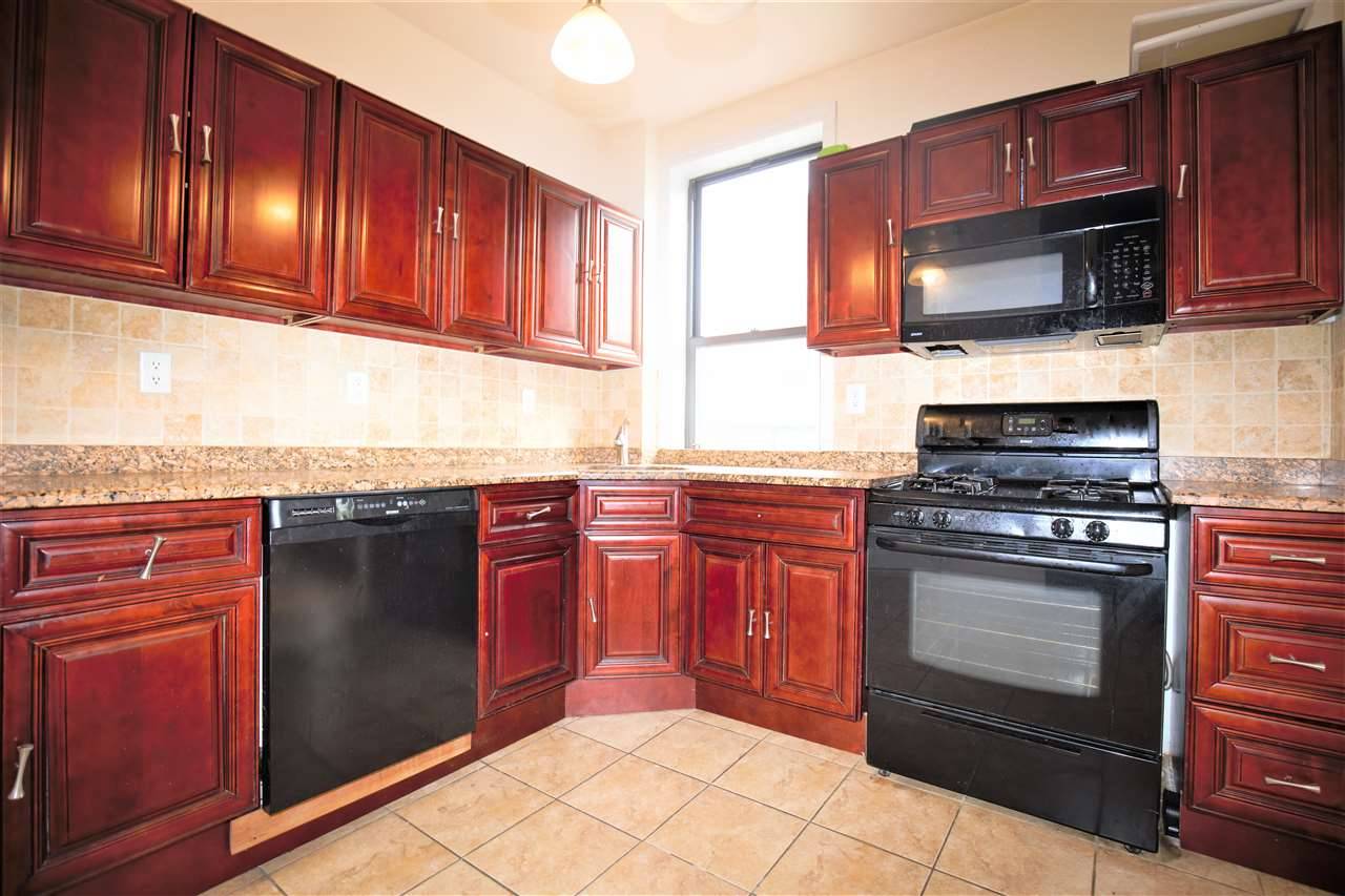 This 3 bed 2 bath apartment features and updated kitchen