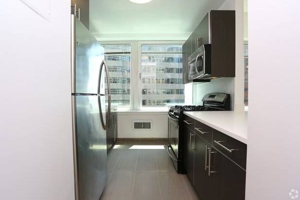Great Convertible 2 bedroom in the Financial District. Directly across from the Seaport and Bridge Views.