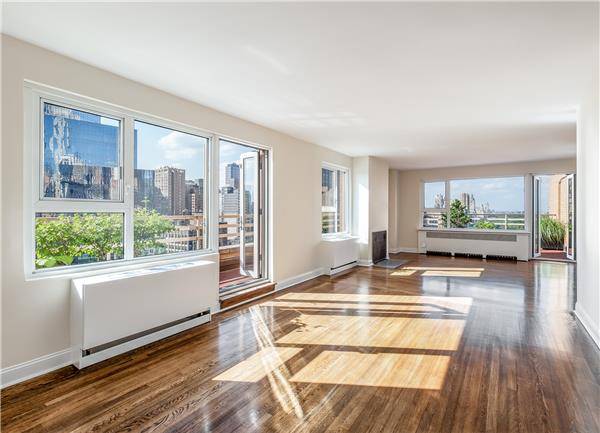 No Broker Fee + 1 Month Free Rent!!!   Limited Time Only!!!    Luxurious Central Park South 3 Bedroom Corner Apartment with 3 Baths featuring a Fireplace and Wrap Around Terrace