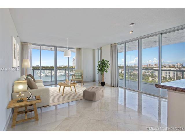 Exquisite corner waterfront residence at the Grand Venetian with endless panoramic views of the bay