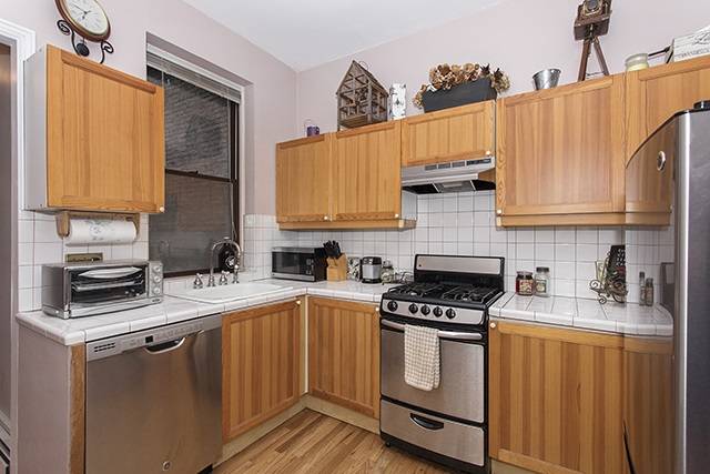 Welcome home to this charming one bedroom with a private yard in downtown Hoboken