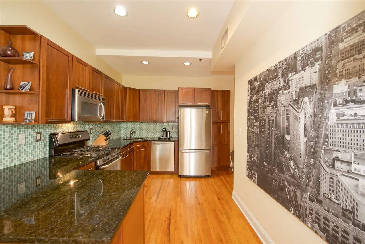 Spacious and bright 2 bedroom + den/2 bathroom home located in the heart of Hoboken